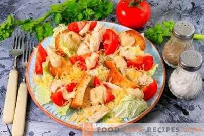 Caesar salad with chicken, Chinese cabbage, crackers and tomatoes